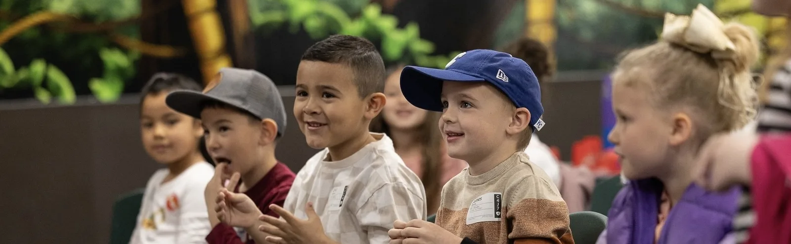 Kids listening during a Sagebrush Kids weekend environment.
