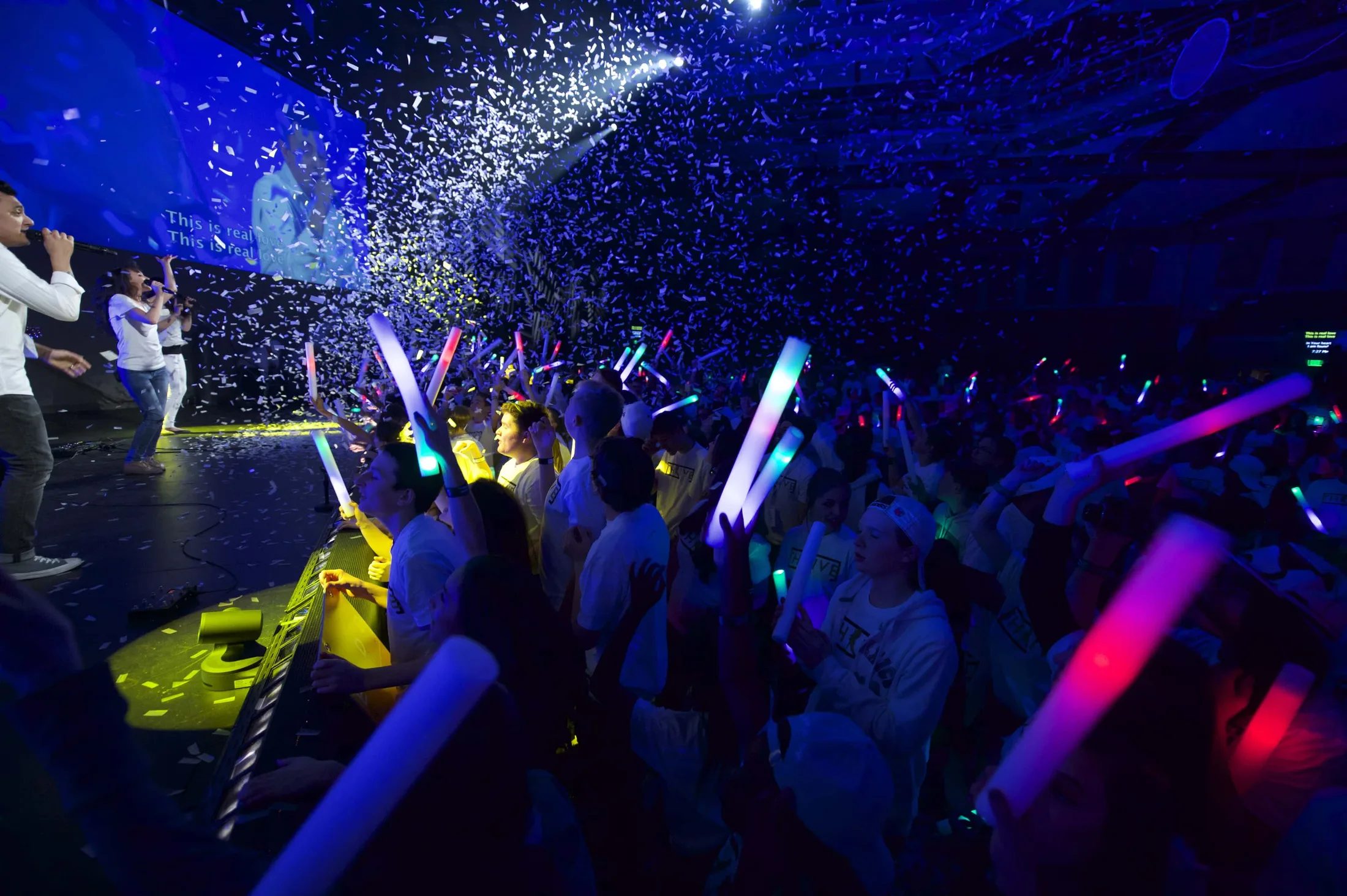 Students worship during a high-energy Remix service.